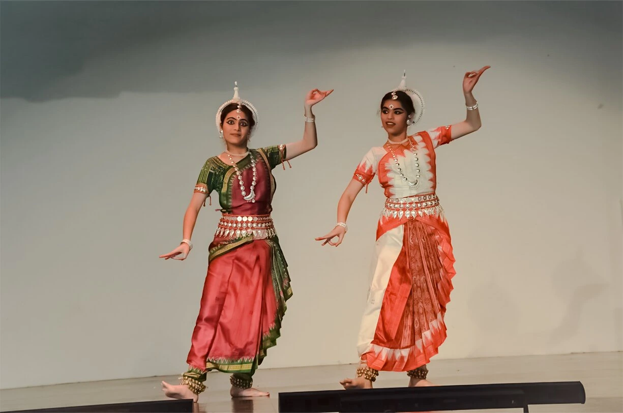 Odissi dancers performing with deep emotion